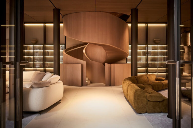 Natural stone wood and glass interiors at Poliform Milan flagship