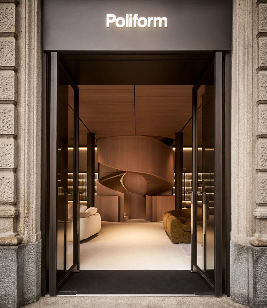 Poliform Lab curated interiors with light oak staircase Milan flagship