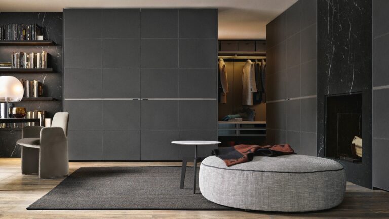 Custom Italian wardrobe system with champagne matte finish by Poliform