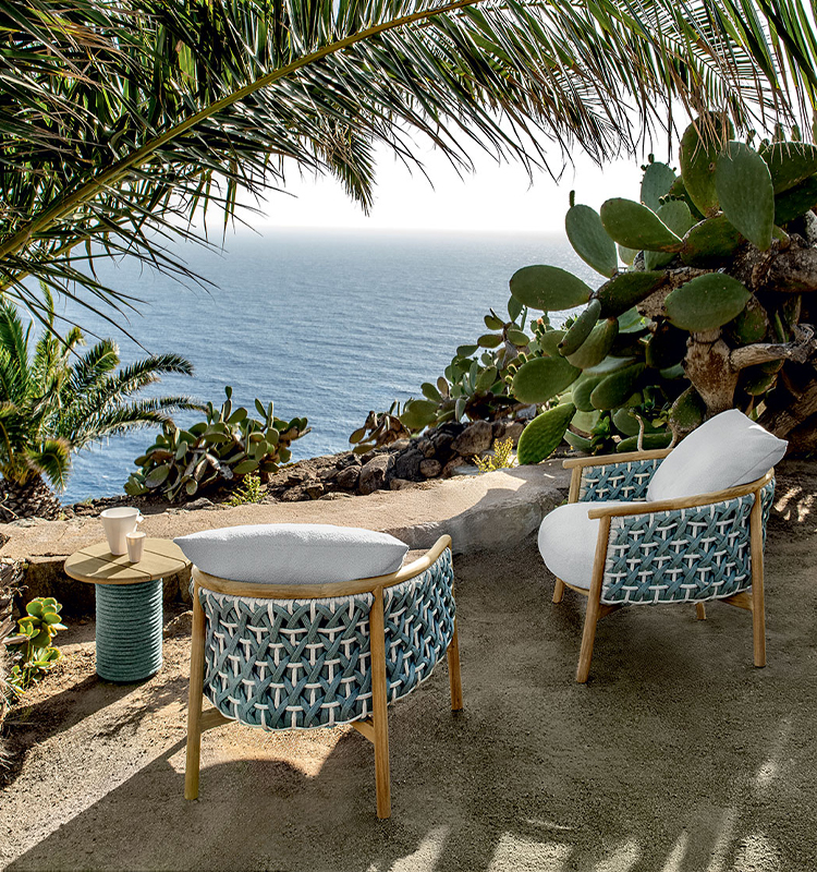 Ethimo Patio chair with patterned rope back in teak and aluminum