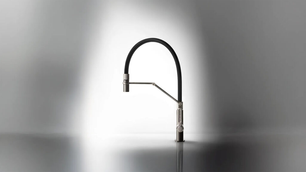 Gessi Officine matte black kitchen faucet in working showroom kitchen La Jolla